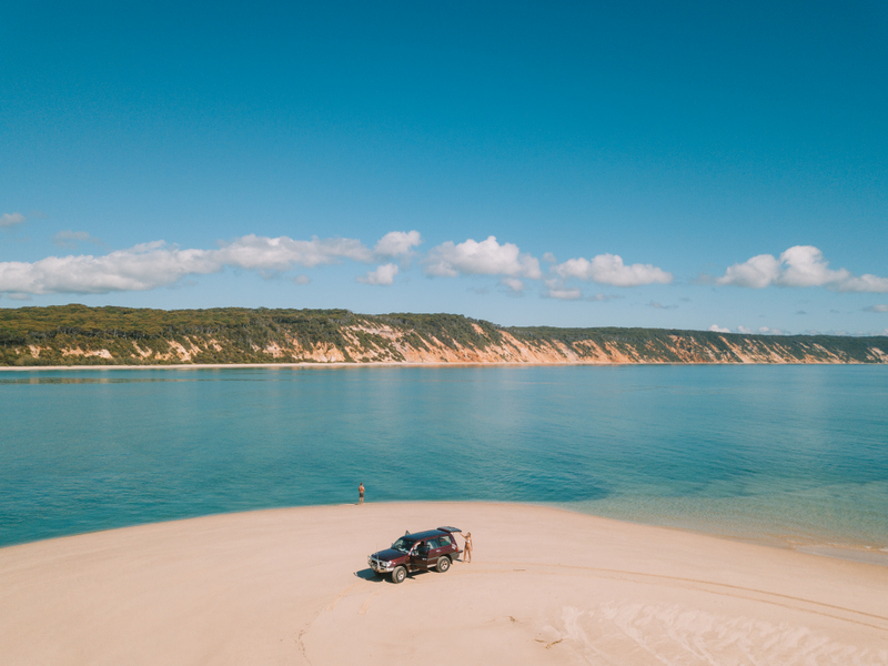 Rainbow Beach Adventure Centre 4WD at Double Island Point with Rainbow Sands in background